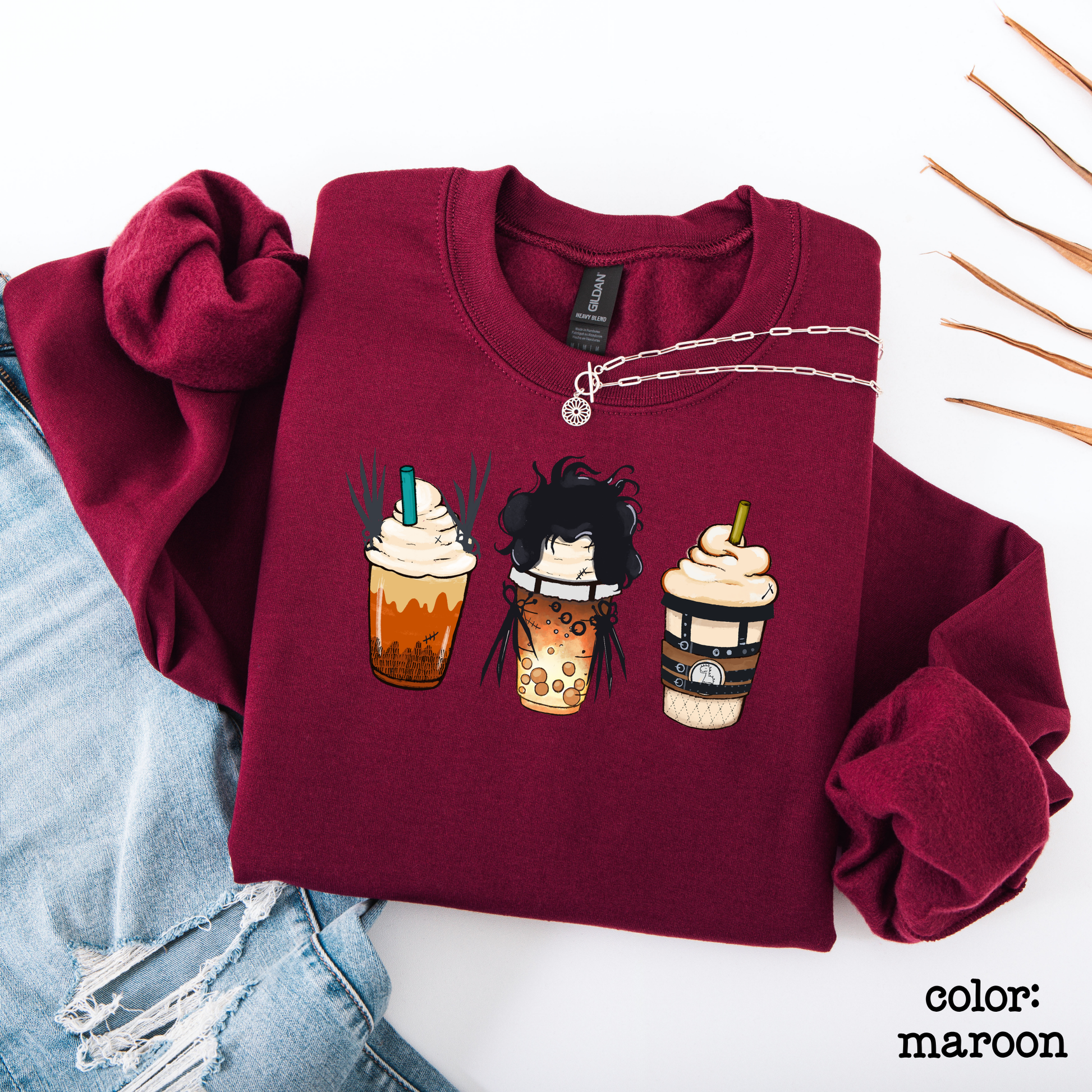Close-up detail of the high-quality spooky coffee print on a soft fabric sweatshirt